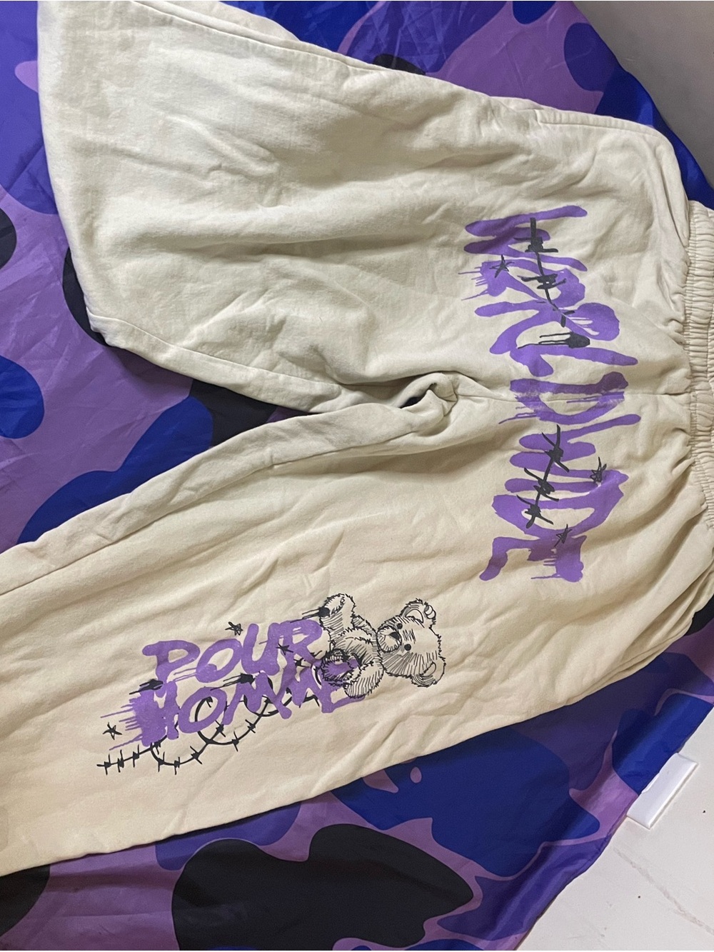 Cream Sweatpants with Purple Graphic Print